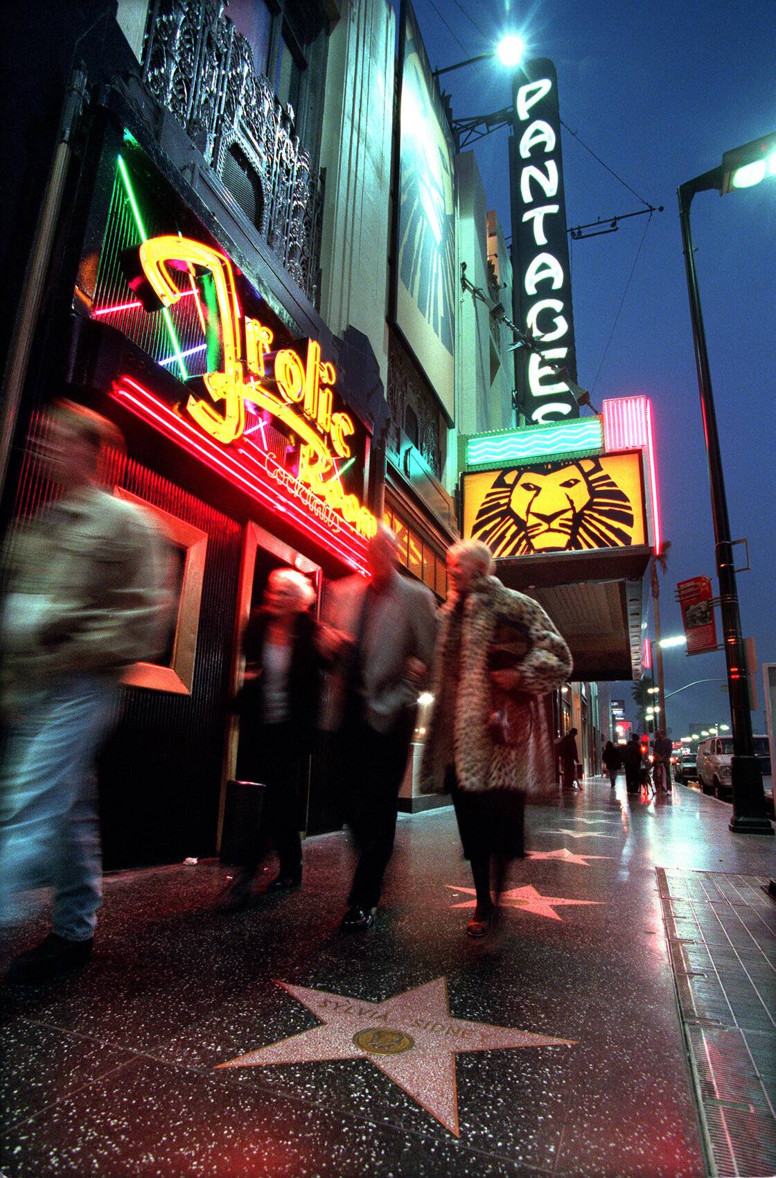 Hollywood and Vine, attracting middleclass crowds to the Pantages theatre, while next door the frol